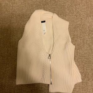 Sweater vest by Akris. Winter white with zipper